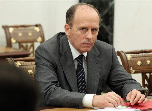 FILE - In this Wednesday, July 3, 2013, file photo, Russian Federal Security Service Chief Alexander Bortnikov attends a meeting in the Kremlin in Moscow. A European Union document released Friday, July 25, 2014, shows that among those targeted by a EU-wide asset freeze and travel ban are Alexander Bortnikov, head of the Russian Federal Security. The new sanctions were announced in a Friday entry to the EU's Official Journal.