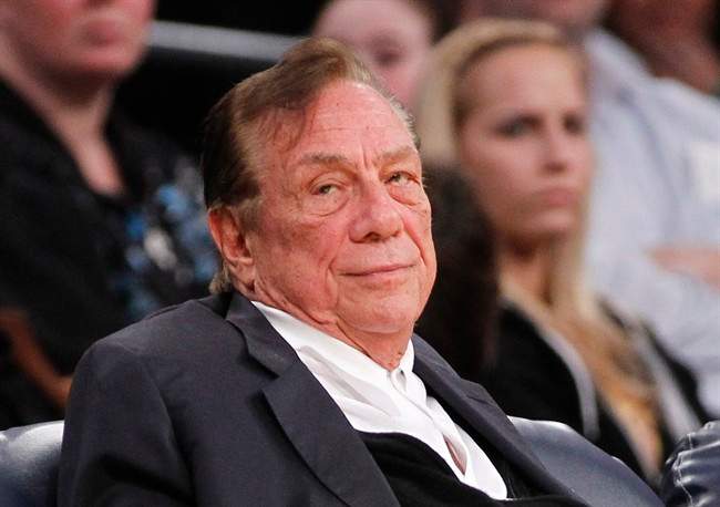 In this Dec. 19, 2011 file photo, Los Angeles Clippers owner Donald Sterling watches the Clippers play the Los Angeles Lakers during an NBA preseason basketball game in Los Angeles.
