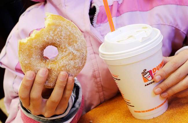 Dunkin' Donuts, the largest bakery chain in the United States, anticipates a sales slowdown. Tim Hortons meanwhile hopes to ramp up U.S. sales.