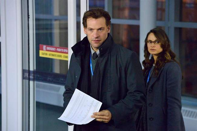 Corey Stoll and Mia Maestro in a scene from 'The Strain.'.
