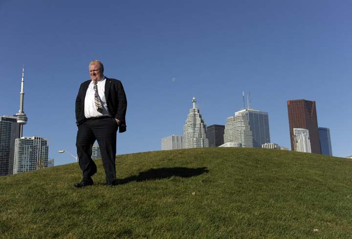 Toronto mayor elect Rob Ford heads back down a small hill near Sugar Beach after having his portrait taken following an appearance on the John Oakley morning radio show on AM640 Oct 27 2010 in Toronto.