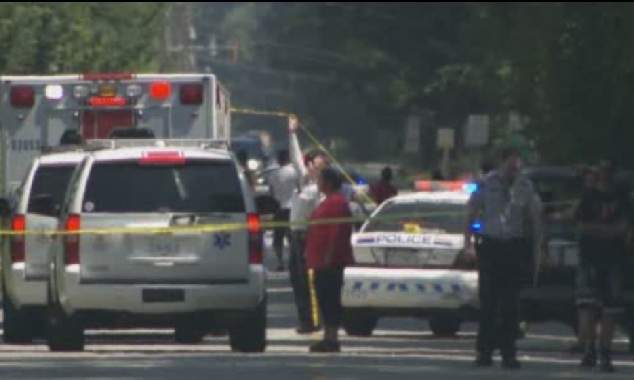 Police investigate the scene of an incident in Surrey that left a woman fighting for her life.