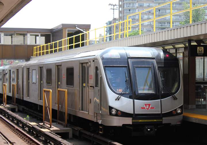 A TTC subway train leaves Davisville Station.