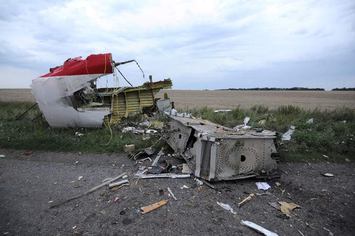 A picture taken on July 17, 2014 shows the wreckages of the malaysian airliner carrying 295 people from Amsterdam to Kuala Lumpur after it crashed, near the town of Shaktarsk, in rebel-held east Ukraine.