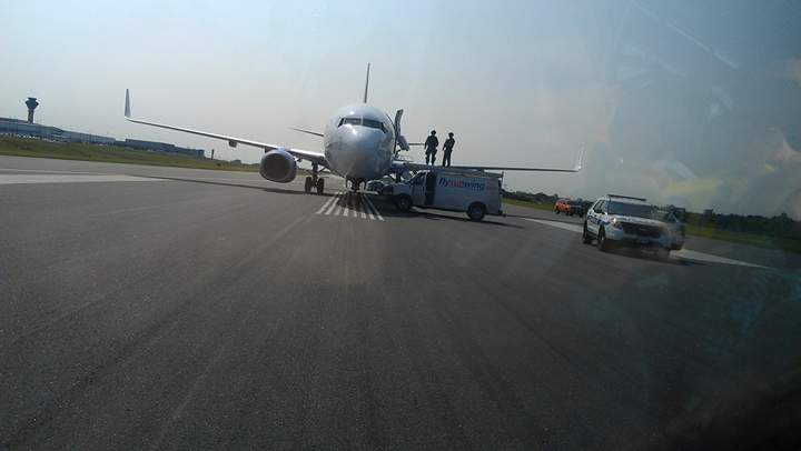 Alain Alphonso posted images of the tactical team and the Sunwing plane on his Facebook page.