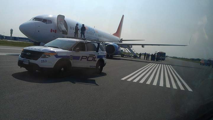 Alain Alphonso posted images of the tactical team and the Sunwing plane on his Facebook page.