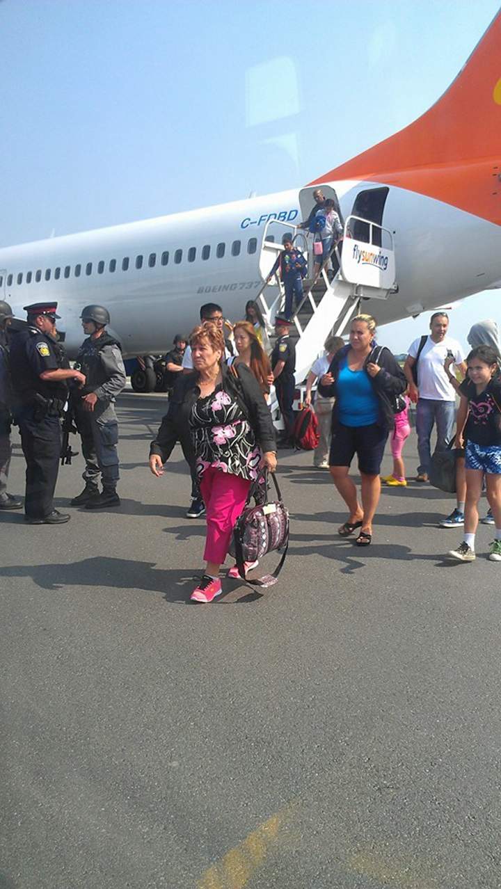 Alain Alphonso posted images of the tactical team and the Sunwing plane on his Facebook page.
