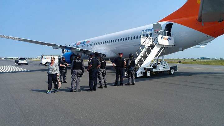 Alain Alphonso posted images of the tactical team and the Sunwing plane on his Facebook page.