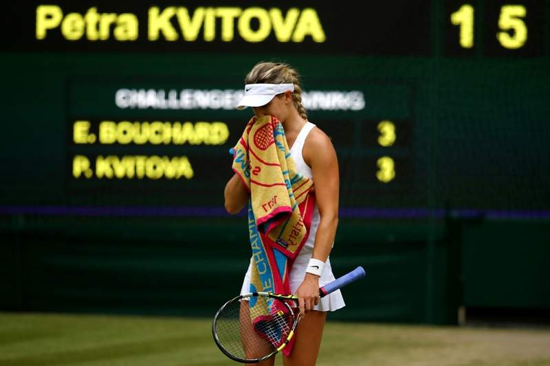Eugenie Bouchard of Canada stands dejected during the Ladies’ Singles final match against Petra Kvitova of Czech Republic on day twelve of the Wimbledon Lawn Tennis Championships at the All England Lawn Tennis and Croquet Club on July 5, 2014 in London, England. (Photo by Al Bello/Getty Images)