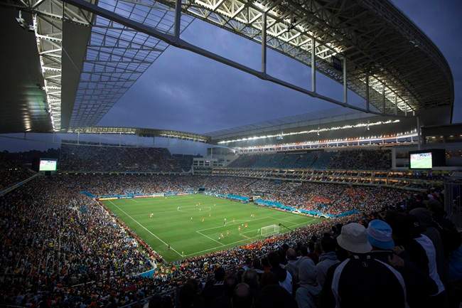 Soccer fans watch the World Cup semifinal match between the Netherlands and Argentina in the Itaquerao Stadium, in Sao Paulo Brazil, Wednesday, July 9, 2014. The match remained scoreless at haltime (AP Photo/Felipe Dana).