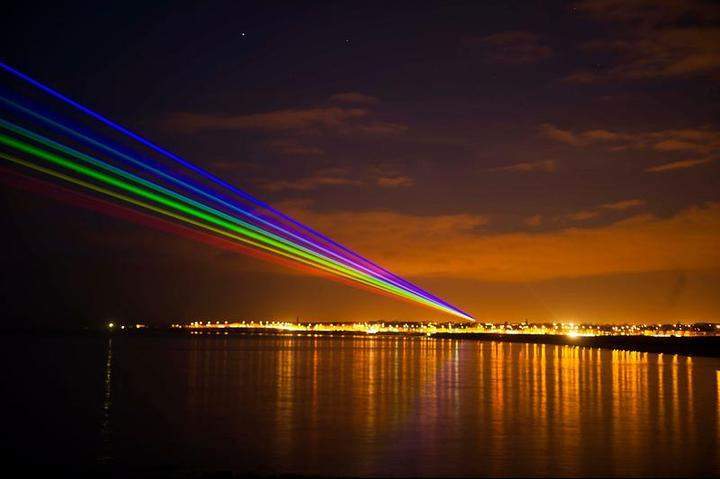 International artist Yvette Mattern shows her stunning laser rainbow projection, Global Rainbow, on March 1, 2012 in Whitley Bay, England.
