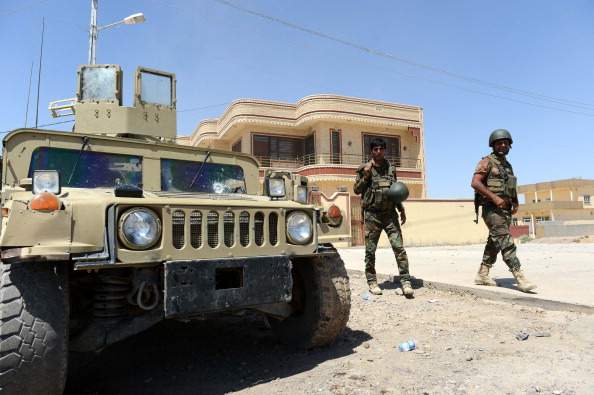 Peshmergas are seen following Peshmerga forces' seizure of Makhmur by repelling Islamic State (IS), formerly known as Islamic State of Iraq and the Levant (ISIL), militants in Makhmur town of Mosul, Iraq on August 11, 2014.
