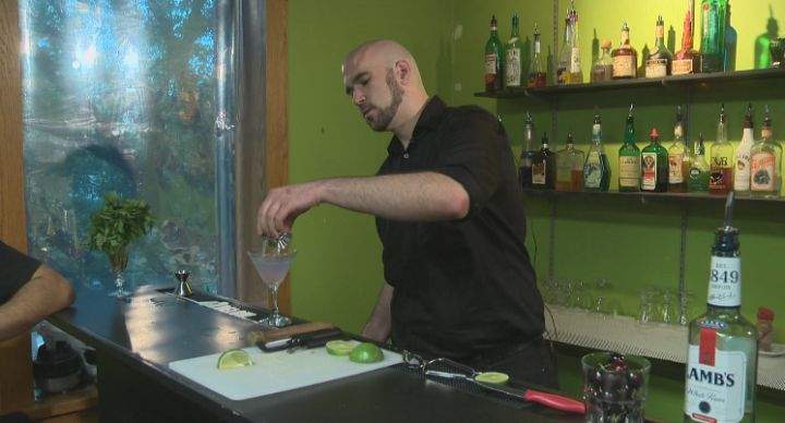 Brady Grumpelt prepares a drink at Edmonton's Fine Art Bartending School.