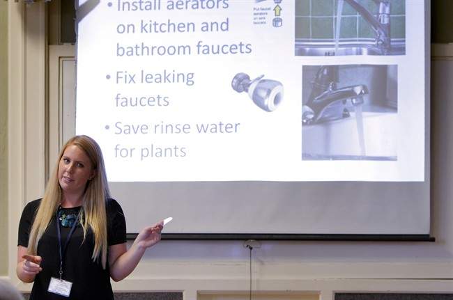Amanda Bunte, a representative with the City of Santa Cruz, goes over water conservation tips during Water School at the Louden Nelson Community Center in Santa Cruz, Calif.