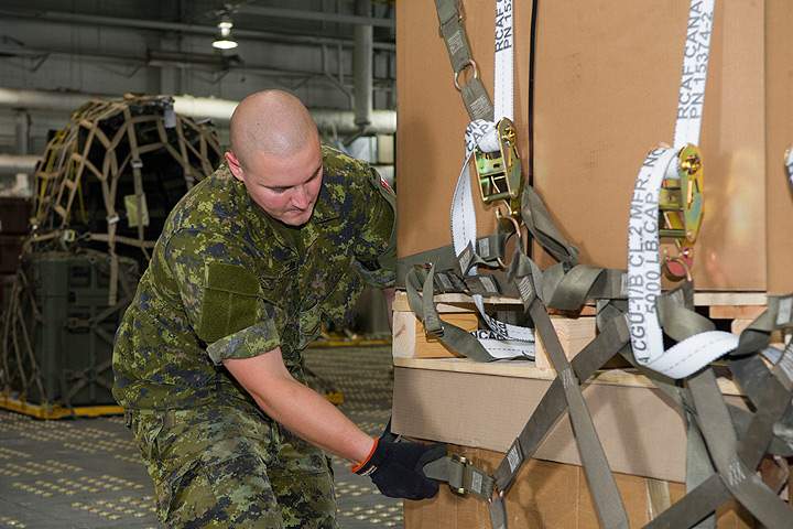 Military material boxes containing non-kinetic military equipment for Ukraine are being prepared by the military personnel of 8 Wing, Canadian Forces Base Trenton, Ontario on August 5, 2014.