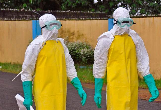The Public Health Agency of Canada says three Winnipeg-based scientists who have been working on the Ebola response in West Africa will not return to Canada on commercial flights.