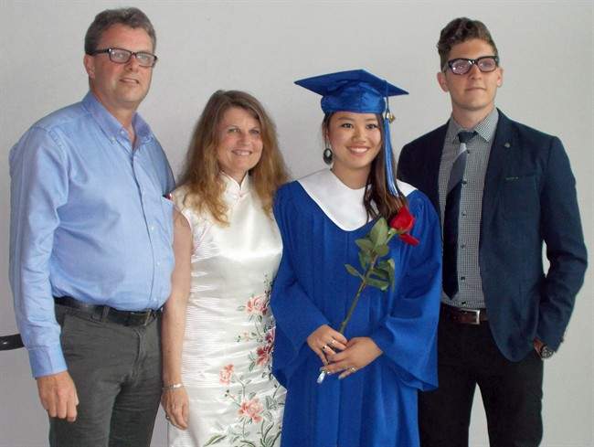 Kevin Garratt, left to right, Julia Dawn Garratt, Hannah Garratt and Simeon Garratt pose in this undated handout photo. THE CANADIAN PRESS/HO - Garratt Family.