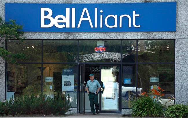 A customer leaves a Bell Aliant retail location in Dartmouth, N.S. on July 23, 2014.