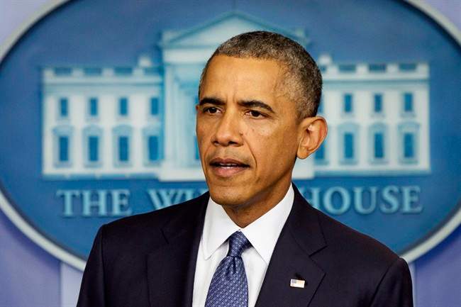 President Barack Obama speaks Friday, Aug. 1, 2014, in the Brady Press Briefing Room of the White House in Washington. 