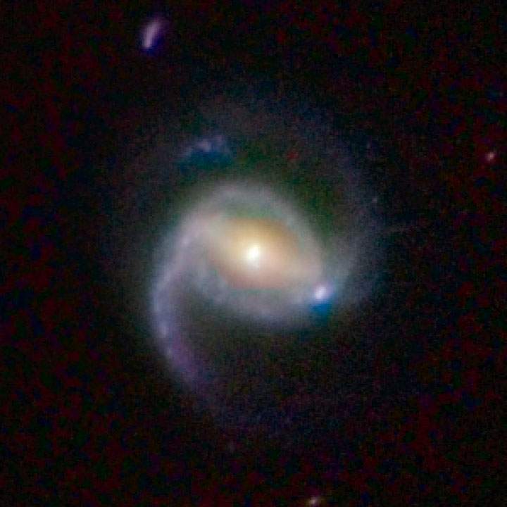 Barred Spiral Galaxy COSMOS 3127341. Citizen scientists around the world have helped classify distant galaxies like this one.