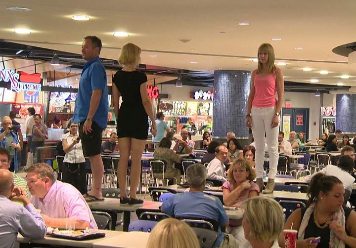 "Oh Captain, my Captain" - Montrealers honour Robin Williams in Eaton Centre food court on August 12, 2014.