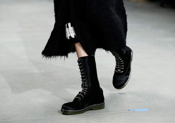 This Feb. 13, 2014 file photo shows an item from the Fall 2014 Calvin Klein collection during Fashion Week in New York. Lucky magazine style editor Laurel Pantin says trends for cooler weather include baby blue outerwear, shearling coats, oversized sweaters, plaids, black-and-white prints, straight trouser pants, hiking boots, blanket coats and Pendleton prints.
