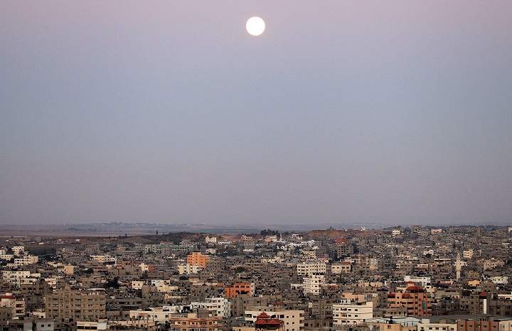 Supermoon rises over Gaza City, Palestinian Territories on August 10, 2014.