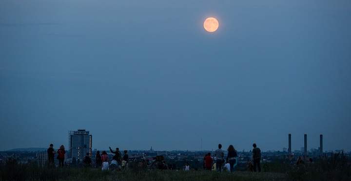 The "supermoon" full moon rises over Berlin on August 10, 2014.