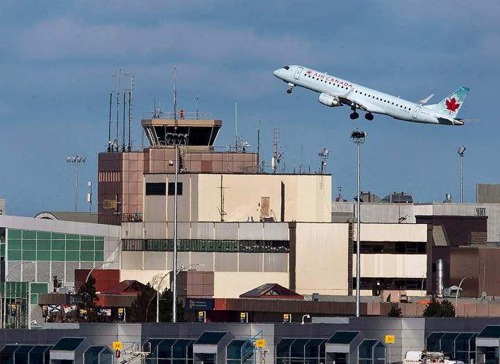 File photo: An Air Canada passenger jet takes off from Halifax on Jan. 21, 2013.