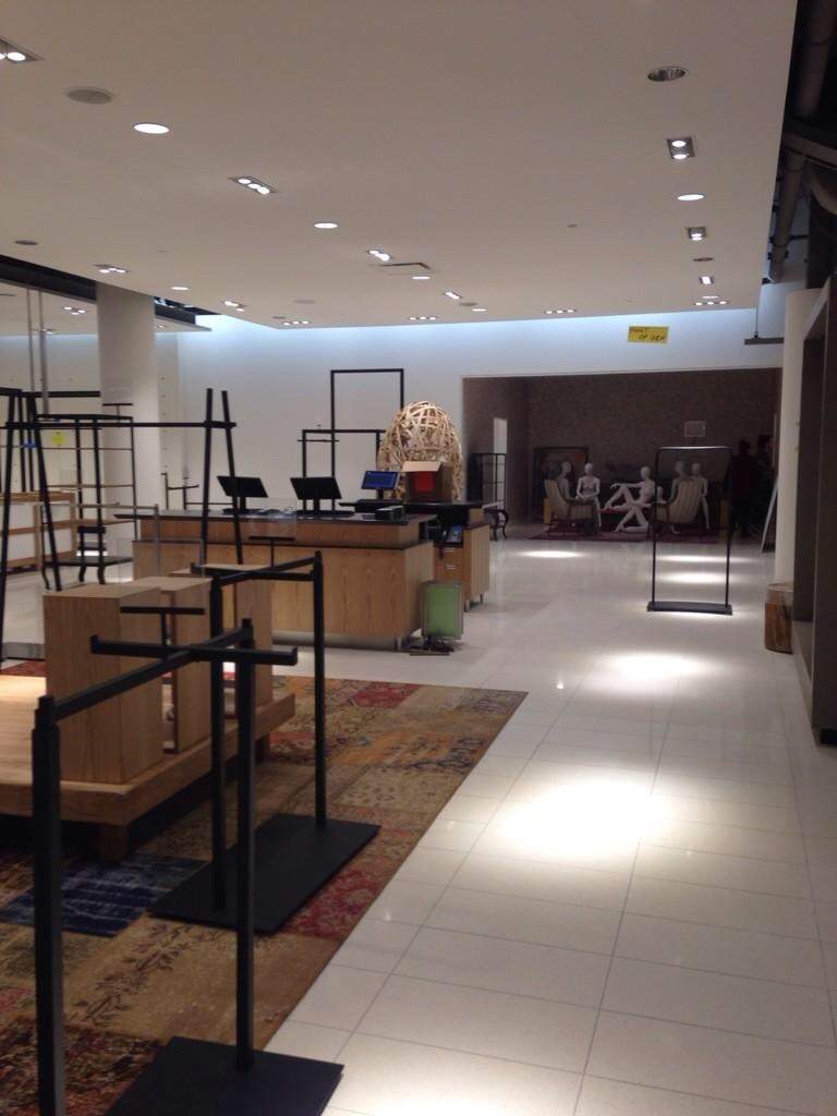 Empty shelves inside Calgary's Nordstrom location will soon be packed with merchandise.