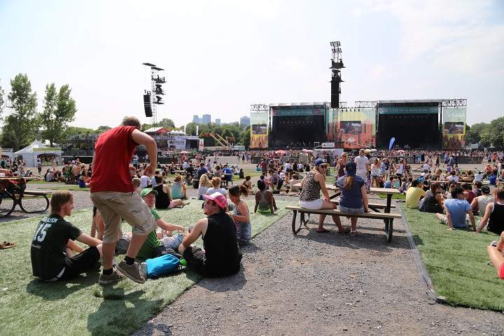 A glimpse of festival-goers at Osheaga in Montreal on Friday, August 1, 2014.