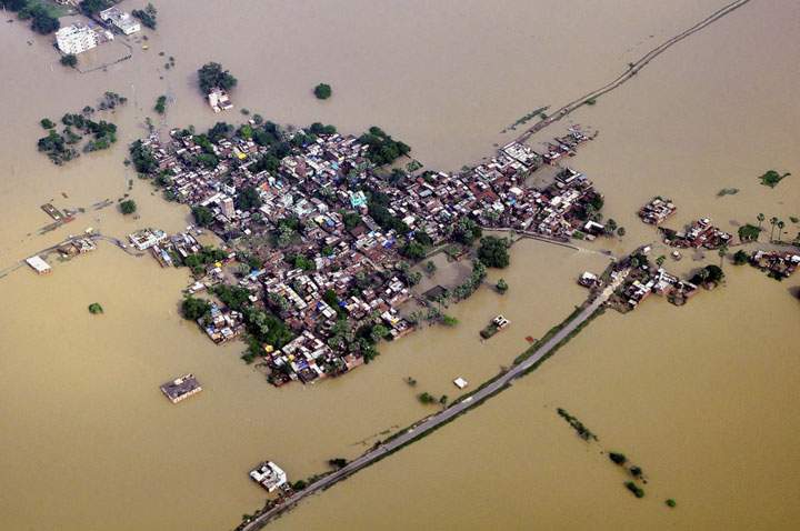 An aerial photo shows houses in a residential area partially submerged by monsoon floods at Nalanda district of Bihar, India, ion Aug. 17.