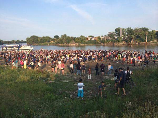 Over 1,000 people gathered at the Alexander Docks on Tuesday to mourn Tina Fontaine and Faron Hall.