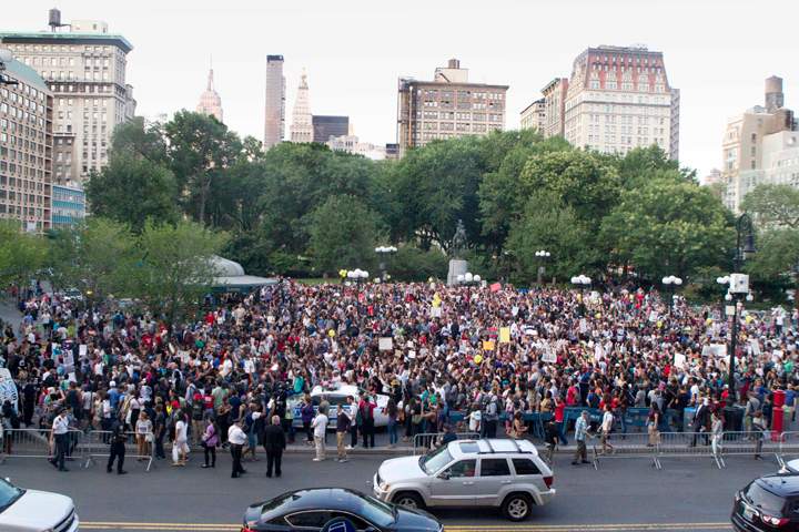 Protesters march in New York City’s Union Square, Thursday, Aug. 14, 2014. 