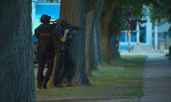 Saskatoon police dealing with a standoff in the 100-block of Avenue O South on Tuesday Aug. 12, 2014.