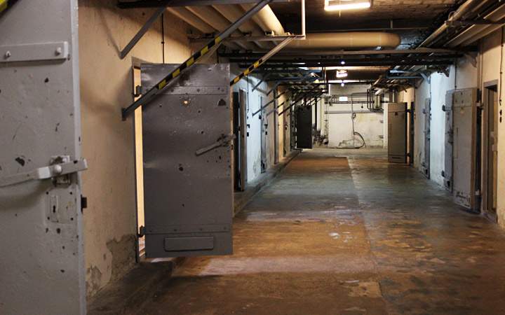 Inside a hallway of concrete basement cells, where Soviets held prisoners in Hohenschönhausen in Berlin.
