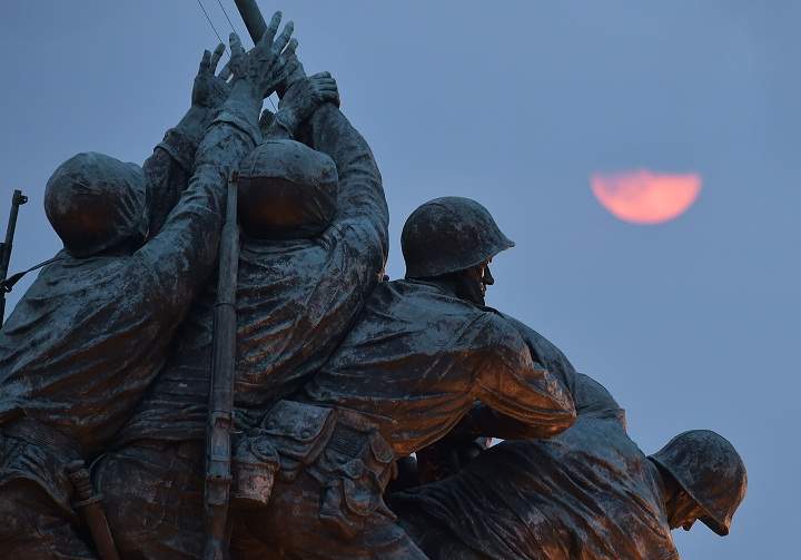 The perigee moon or "supermoon" rises above the US Marine Corp War Memorial on August 10, 2014 in Arlington, Virginia.