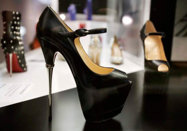 A pair of 2013 Christian Louboutin shoes is on display at an exhibit at the Brooklyn Museum in New York on Sept. 4, 2014.