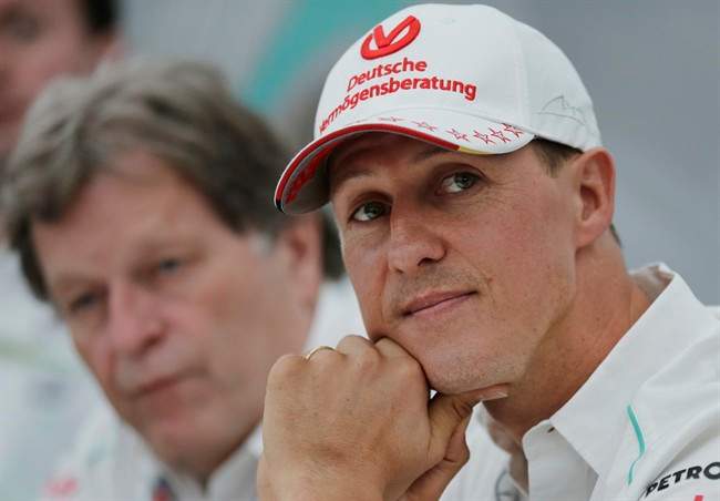 Former Mercedes F1 driver Michael Schumacher of Germany pauses during a news conference in Suzuka, Japan on Oct. 4, 2012. 