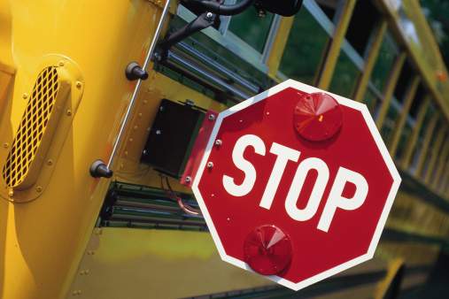 File photo of stop sign on school bus.