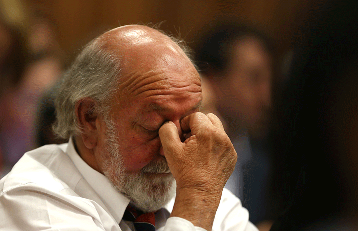 Father of the late Reeva Steenkamp, Barry Steenkamp, rubs his eyes in court in Pretoria, South Africa, Friday, Sept. 12, 2014