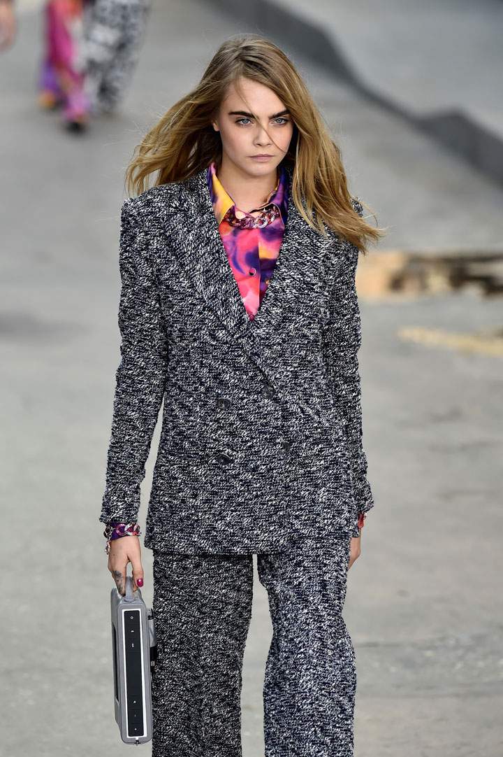 Model Cara Delevingne walks the runway during the Chanel show as part of the Paris Fashion Week Womenswear Spring/Summer 2015 on September 30, 2014 in Paris, France.