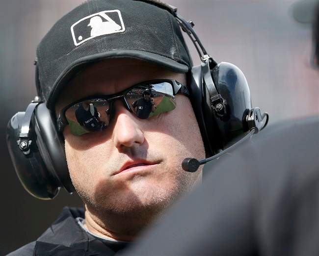 MLB umpires could soon be equipped with microphones to announce replay decisions to the crowd.