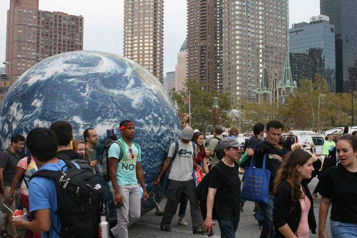 Ahead of a climate summit in New York City, a group of protesters carry a giant globe during the People’s Climate March on September 21, 2014. Similar marches occurred across Canada.