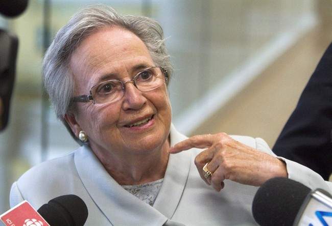 Former Quebec lieutenant governor Lise Thibault leaves a courtroom, Monday July 28, 2014 in Quebec City. The fraud trial of Thibault will resume Oct. 2.