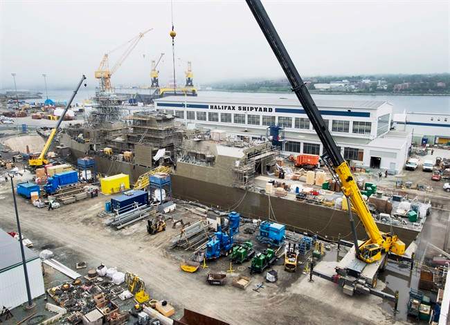 A Navy ship undergoes a mid-life refit at the Irving Shipbuilding facility in Halifax on July 3, 2014. 