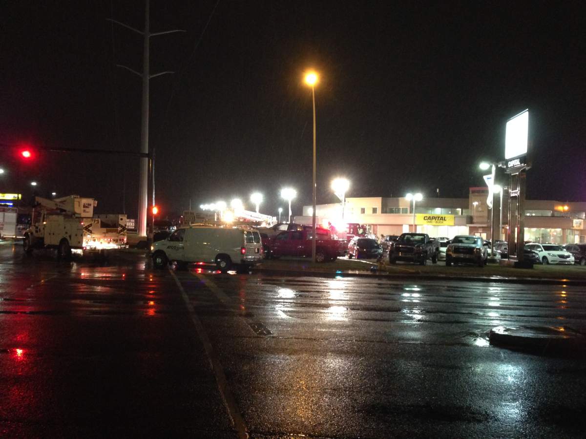 An Edmonton dealership is damaged by a fire, Monday, September 8, 2014. 