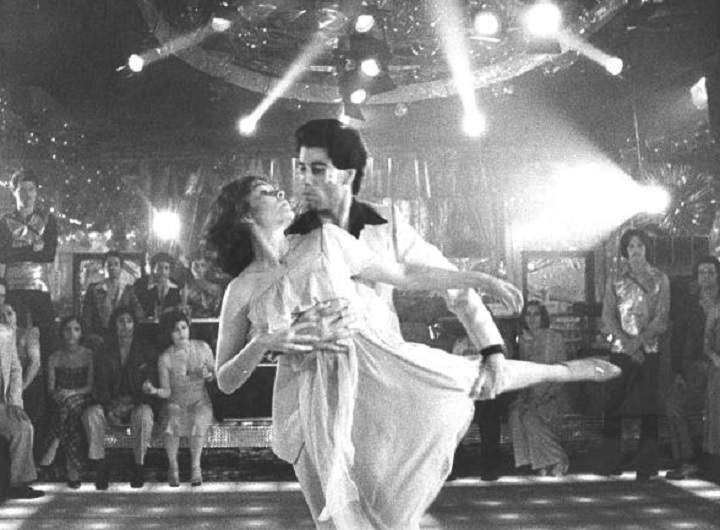 Actor John Travolta dances with Karen Lynn Gorney in scene from movie ‘Saturday Night Fever’ directed by John Badham.