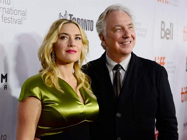 Kate Winslet and Alan Rickman arrive on the red carpet for the film “A Little Chaos ” at the Toronto International Film Festival in Toronto on Saturday Sept. 13, 2014.