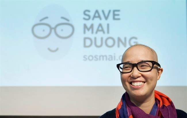 Mai Duong smiles following a news conference in Montreal, Tuesday, September 16, 2014. Quebec woman\’s desperate online plea for a compatible stem-cell donor in her bid to fight cancer a second time is shedding light on the lack of minorities on official lists in Canada and abroad.